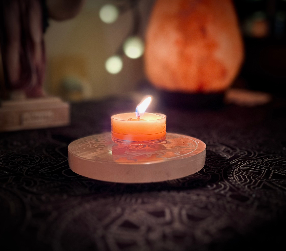 A candle holding vigil.