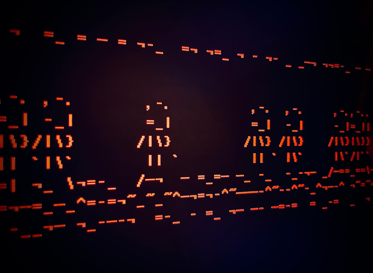 ASCII zombies marching across a terminal.